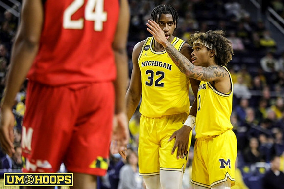 Tarris Reed Jr. (32) and Dug McDaniel (0)