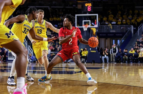 Tarris Reed Jr. (32) and Joey Baker (15)