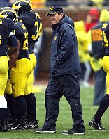 Lloyd Carr, Michael Hart, and Will Paul