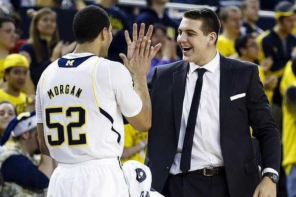 Jordan Morgan (52) and Mitch McGary (4)