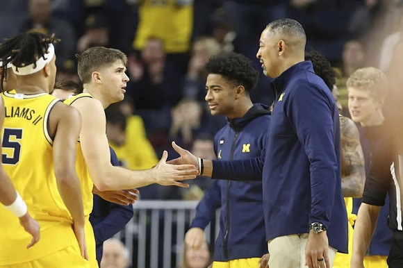 Juwan Howard and Michigan Team