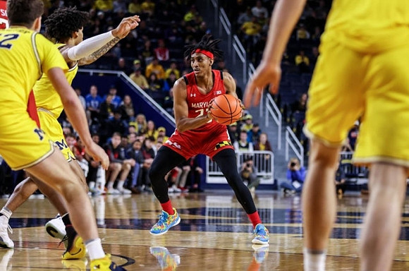 Isaiah Barnes (11) and Will Tschetter (42)