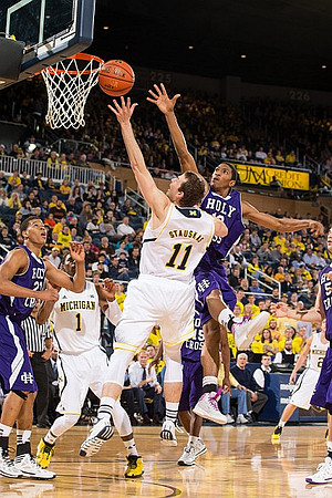 Glenn Robinson III (1), Nik Stauskas (11), and Spike Albrecht (2)