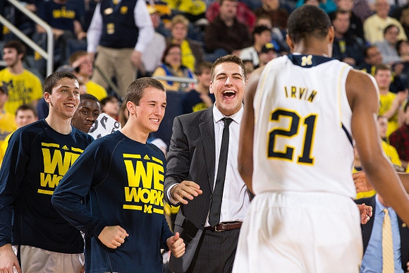 Sean Lonergan (20), Andrew Dakich (5), Mitch McGary (4), and Zak Irvin (21)