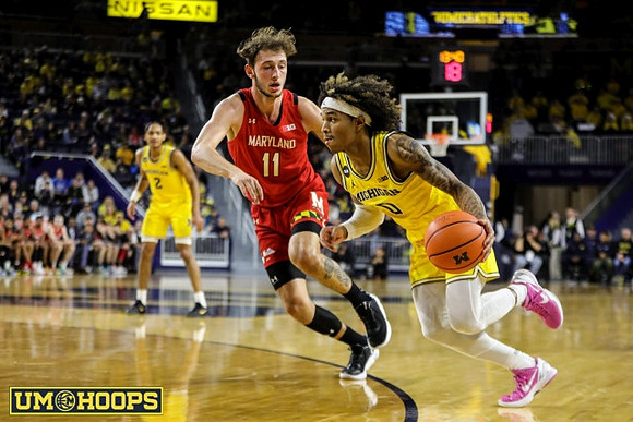 Kobe Bufkin (2) and Dug McDaniel (0)