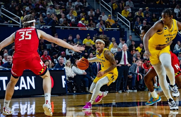 Dug McDaniel (0) and Tarris Reed Jr. (32)