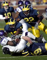 Joey Sarantos (59), Grant Mason (13), Jamar Adams (22), and Troy Nienberg (10)