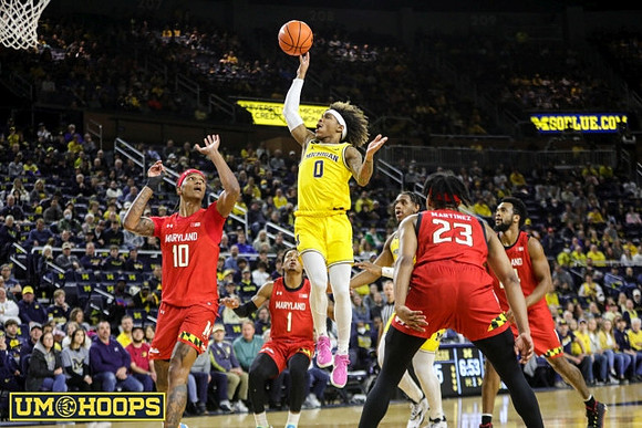 Dug McDaniel (0) and Tarris Reed Jr. (32)