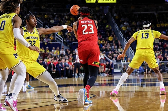Dug McDaniel (0), Tarris Reed Jr. (32), and Jett Howard (13)