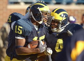 Steve Breaston (15), Anton Campbell (9), and Darnell Hood (4)