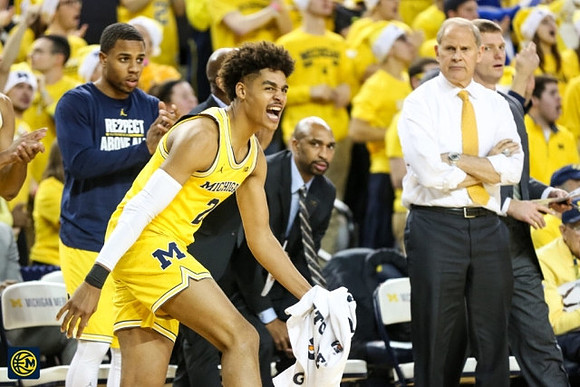 Jordan Poole (2), Jaaron Simmons (5), Saddi Washington, and John Beilein