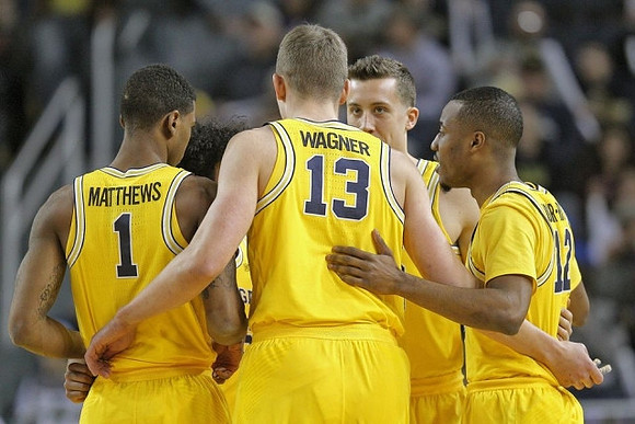 Charles Matthews (1), Moritz Wagner (13), Duncan Robinson (22), and Muhammad-Ali Abdur-Rahkman (12)