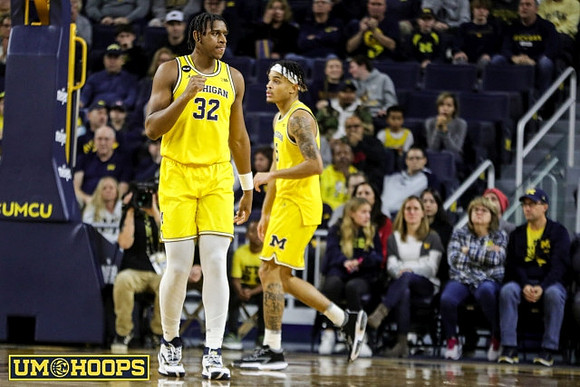 Tarris Reed Jr. (32) and Terrance Williams II (5)