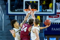 D.J. Wilson (5) and Mark Donnal (34)