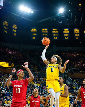 Dug McDaniel (0) and Tarris Reed Jr. (32)