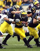 Michael Hart, Jake Long, Mark Bihl, and Adam Kraus