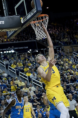 Moritz Wagner (13) and Duncan Robinson (22)