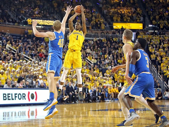 Charles Matthews (1) and Moritz Wagner (13)