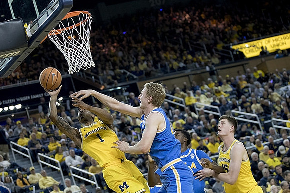 Charles Matthews (1) and Jon Teske (15)
