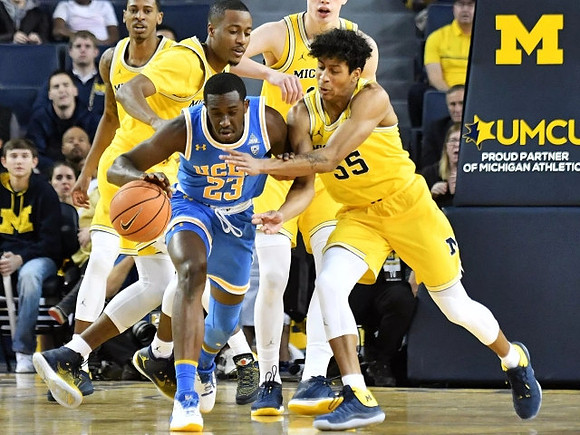 Charles Matthews (1), Moritz Wagner (13), Moritz Wagner (13), and Eli Brooks (55)