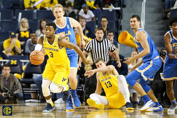 Zavier Simpson (3) and Moritz Wagner (13)