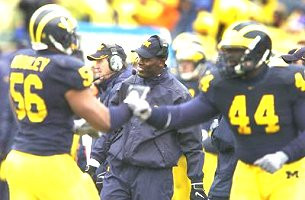 LaMarr Woodley, James McKinney, Lloyd Carr, and Ron English