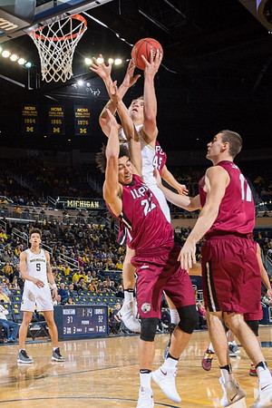 D.J. Wilson (5) and Mark Donnal (34)