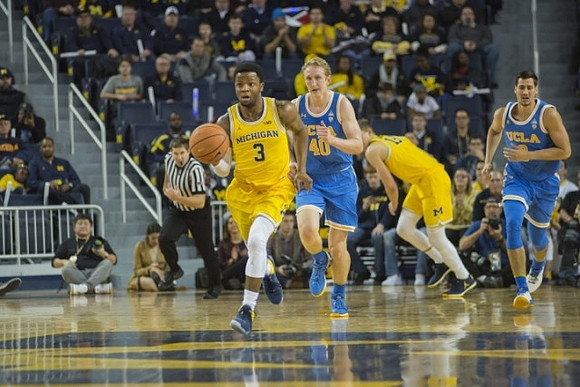 Zavier Simpson (3) and Moritz Wagner (13)