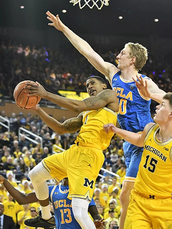 Charles Matthews (1) and Jon Teske (15)