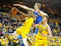 Charles Matthews (1) and Jon Teske (15)