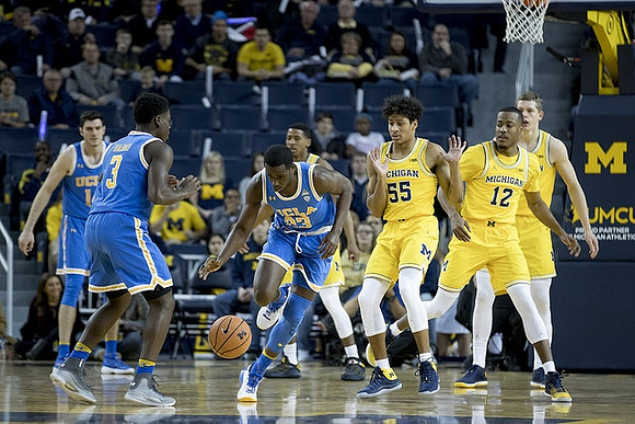 Charles Matthews (1), Eli Brooks (55), Muhammad-Ali Abdur-Rahkman (12), and Moritz Wagner (13)