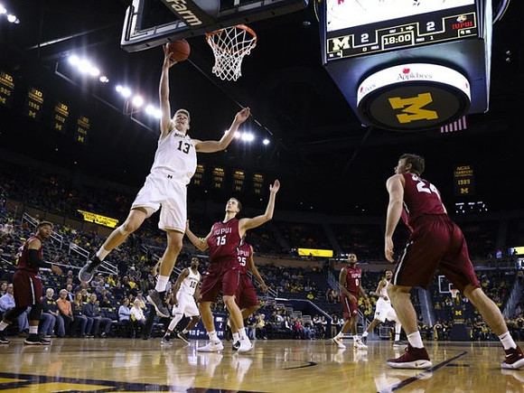 Moritz Wagner (13) and Derrick Walton Jr. (10)