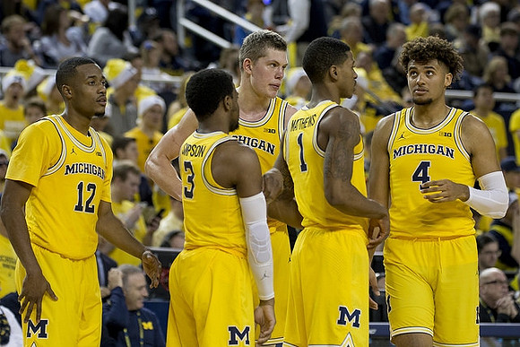 Muhammad-Ali Abdur-Rahkman (12), Zavier Simpson (3), Moritz Wagner (13), Charles Matthews (1), and Isaiah Livers (4)