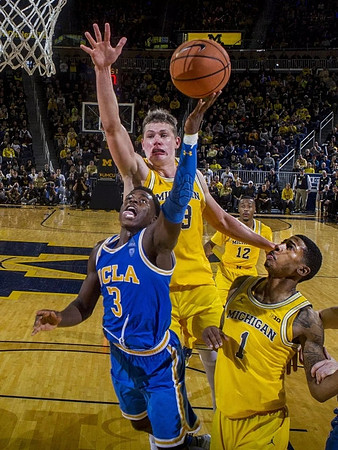 Charles Matthews (1), Moritz Wagner (13), and Muhammad-Ali Abdur-Rahkman (12)