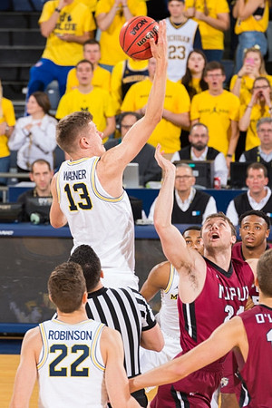 Moritz Wagner (13) and Duncan Robinson (22)