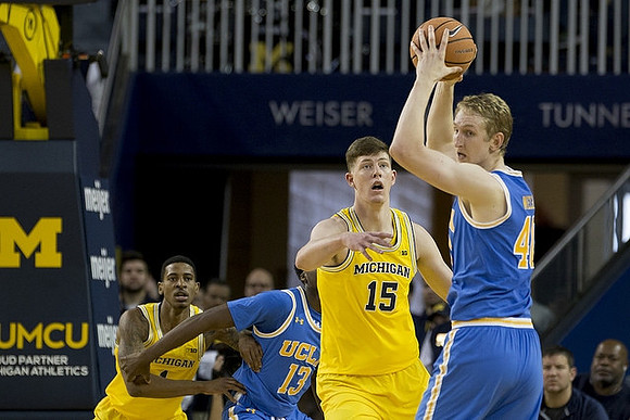 Charles Matthews (1) and Jon Teske (15)