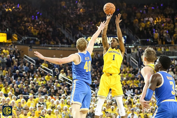 Charles Matthews (1) and Moritz Wagner (13)