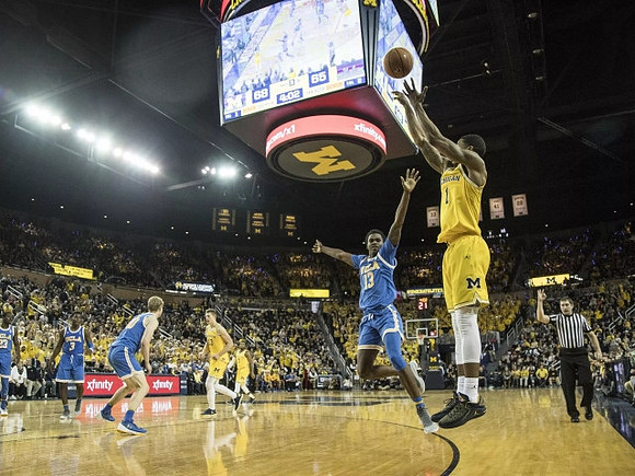 Charles Matthews (1) and Moritz Wagner (13)