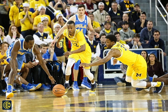 Muhammad-Ali Abdur-Rahkman (12) and Zavier Simpson (3)