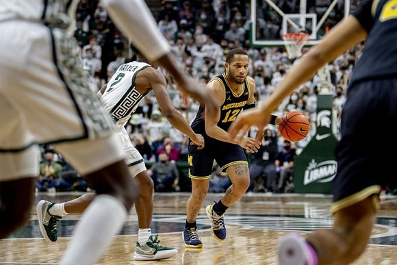 DeVante' Jones (12)