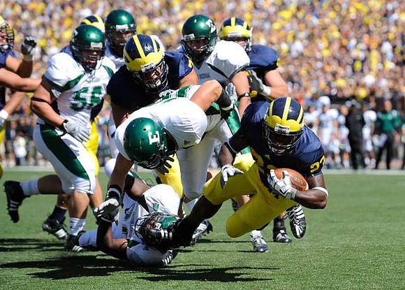 Mark Huyge (72) and Carlos Brown (23)