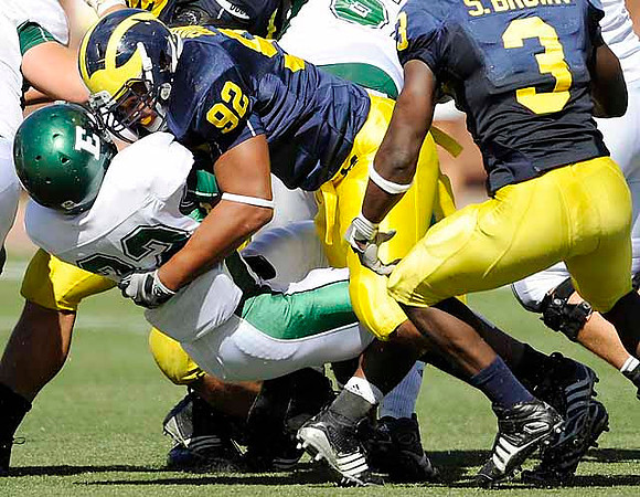 Greg Banks (92) and Stevie Brown (3)