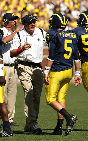 Rich Rodriguez and Tate Forcier (5)