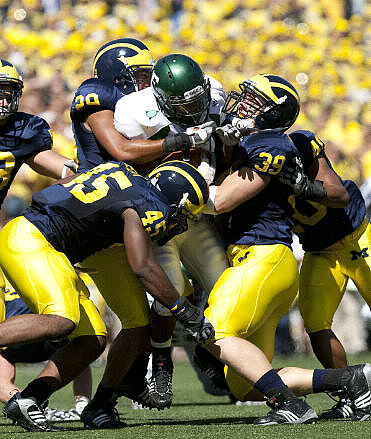 Obi Ezeh (45), Troy Woolfolk (29), Will Heininger (39), and Michael Williams (40)