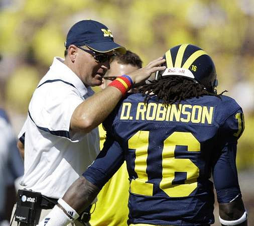 Rich Rodriguez and Denard Robinson (16)