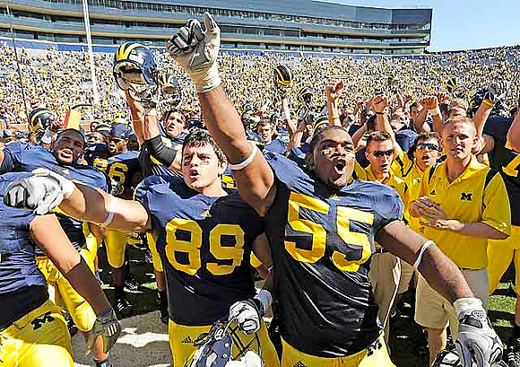 Kevin Koger (86), Tim North (89), and Brandon Graham (55)