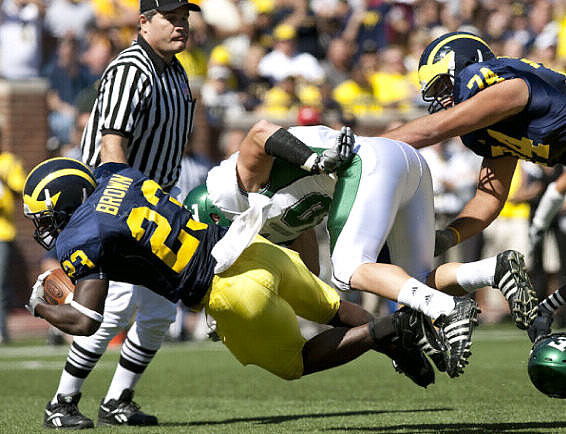 Carlos Brown (23) and John Ferrara (74)