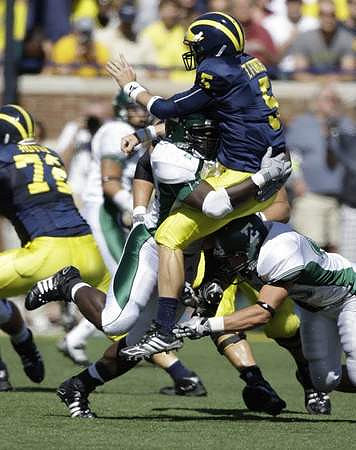 Mark Huyge (72) and Tate Forcier (5)