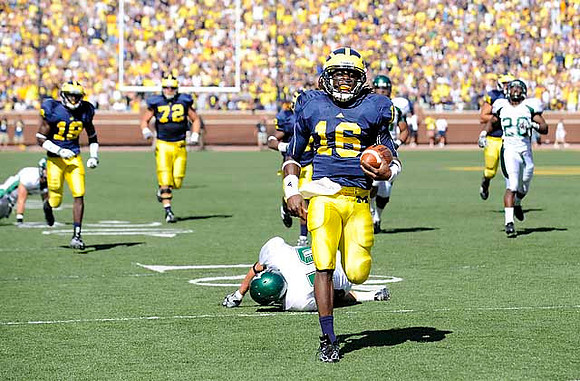 Kelvin Grady (19), Mark Huyge (72), and Denard Robinson (16)