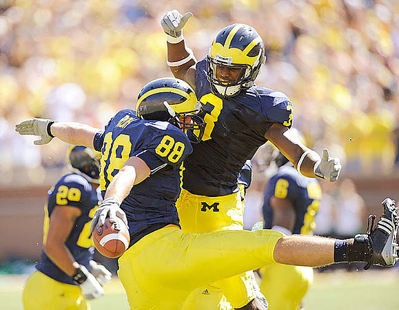 Troy Woolfolk (29), Craig Roh (88), and Stevie Brown (3)